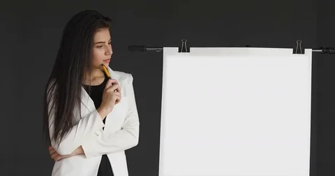 Working woman thinking presentation with blank white board Stock Footage 85072711