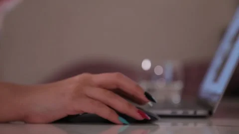 Working woman using computer laptop, hand touching control wireless mouse Stock Footage 148533750