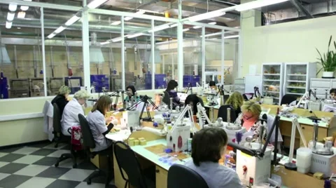 Working women at one of manufacturing divisions of the Estet Jewelry House Stock Footage