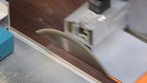 Working woodworking machine, circular saw saws chipboard blank into thin slats Stock Footage 128391395