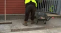 Workman cleaning up mess HD Footage