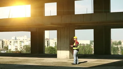 Workman at construction site Stock Footage 83185112