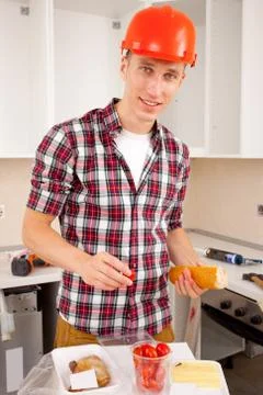Workman dines Stock Photos
