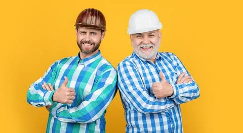 Workman generation men on background, thumb up. photo of workman generation men Stock Photos