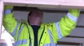 Workman with a hammer HD Footage