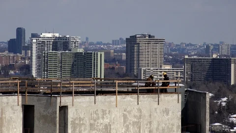 Workman on Highrise rooftop. Stock Footage 85845765