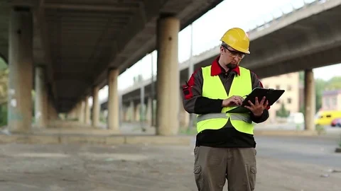 Workman with personal computer under ove... | Stock Video | Pond5