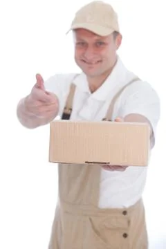 Workman pointing to a cardboard box Stock Photos