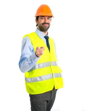 Workman pointing to the front Stock Photos
