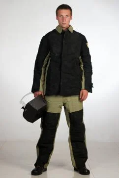 Workman  posing in overalls. Stock Photos
