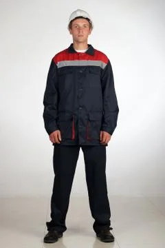 Workman  posing in overalls. Foto stock