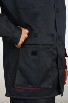 Workman  posing in overalls. 스톡 사진