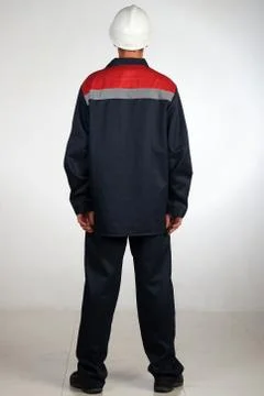 Workman  posing in overalls. Stock Photos