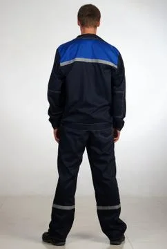 Workman  posing in overalls. Stock Photos