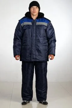 Workman  posing in overalls. Stock Photos