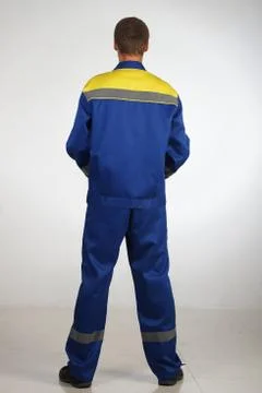 Workman  posing in overalls. Foto stock