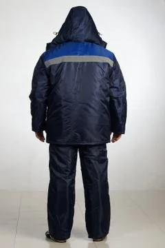 Workman  posing in overalls. Stock Photos