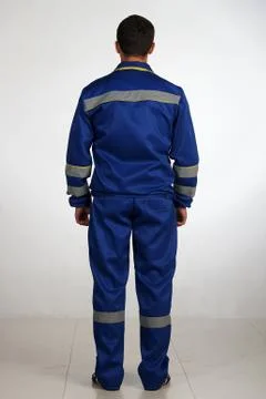 Workman  posing in overalls. Stock Photos