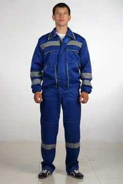 Workman  posing in overalls. Foto stock