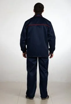 Workman  posing in overalls. Stock Photos
