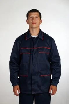 Workman  posing in overalls. Stock Photos