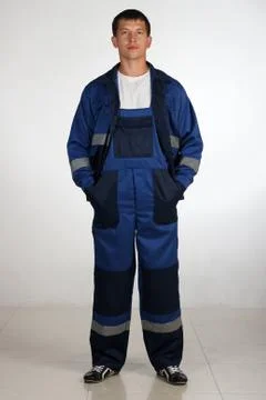 Workman  posing in overalls. Foto stock