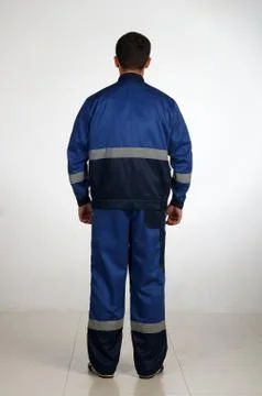 Workman  posing in overalls. Stock Photos