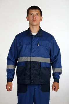 Workman  posing in overalls. Stock Photos