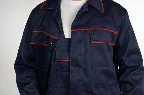 Workman  posing in overalls. Stock Photos