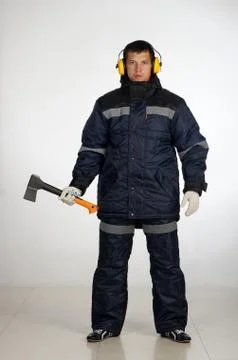 Workman  posing in overalls. Stock Photos