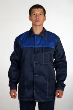 Workman  posing in overalls. 스톡 사진