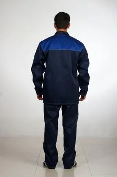 Workman  posing in overalls. Stock Photos