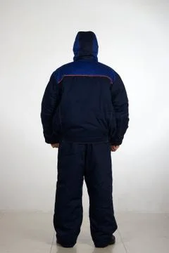 Workman  posing in overalls. Stock Photos
