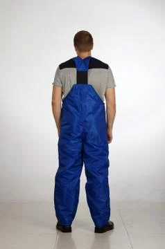 Workman  posing in overalls. Stock Photos