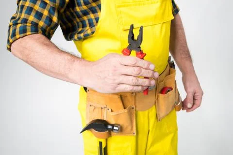Workman with tool belt Stock Photos