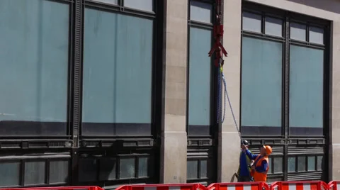 Workmen adjusting chains on Crane cable Stock Footage 37232000