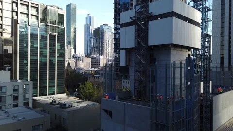 Workmen on highrise building project 库存影片 150347183