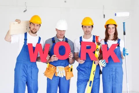 Workmen with word WORK Stock Photos