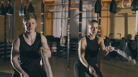 Workout with battle ropes Stock Footage 152947595
