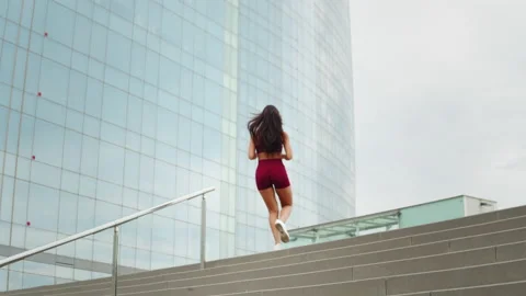 Workout cardio running up and jumping the stairs training. woman going run up Video stock 139482894