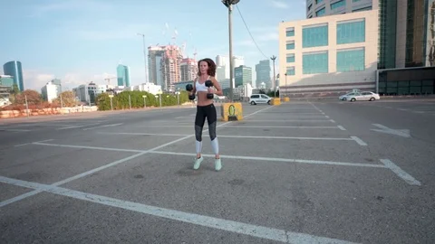 Workout with dumbbell weights Stock Footage 118970993