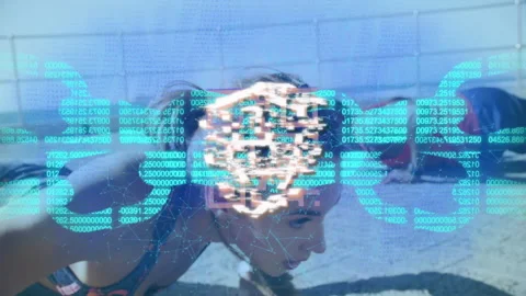 Workout duo doing pushups on sandy court while movements activating data overlay 動画素材 310438483