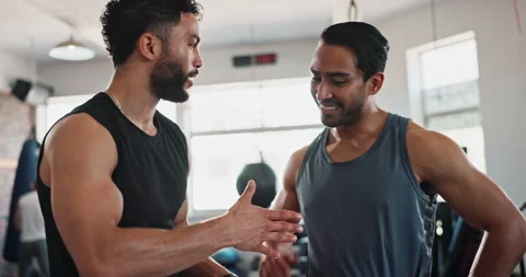 Workout, handshake and personal trainer with people in gym for training, muscle Stock Footage 290059624
