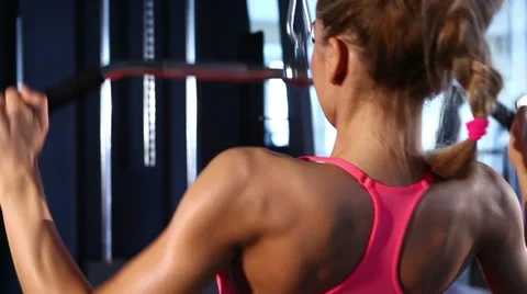 Workout with machine at the gym Stock Footage 49732869