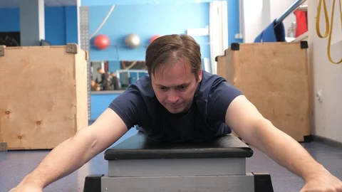 Workout men, warm-up exercises, strength, endurance. training in a fitness club Stock Footage 120541586