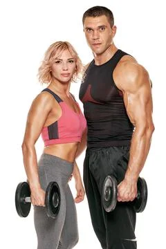 Workout partners with dumbbells Stock-Fotos