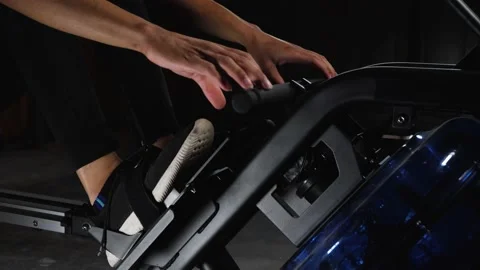 Workout on rowing machine Stock Footage 160046997