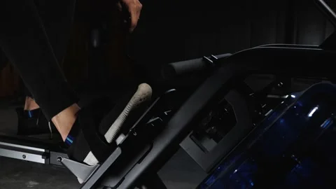 Workout on rowing machine Stock Footage 160047144