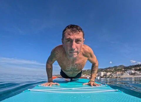 Workout on stand up paddle board Foto stock