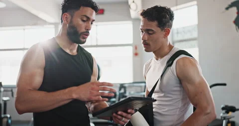 Workout, tablet and personal trainer with people in gym for training, exercise Stock Footage 290131301
